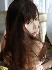 Anri Sugihara posing in light lingerie in big breasts