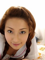Asian schoolgirl is an adorable teen who loves showing off her hot body