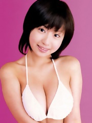 Big tits asian Hitomi Kitamura posing in white lingerie