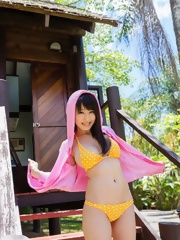 Busty asian Arisa Misato posing outdoors