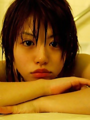 Hitomi Hayasaka Asian teen disrobing for a hot bath showing nude hot body