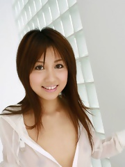 Rika Yuuki Asian teen is a lovely model who enjoys flashing her hot body