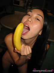 Skinny asian teen gets drunk and wild with a banana