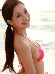 Very beautiful model Fumina Suzuki posing in red bikini