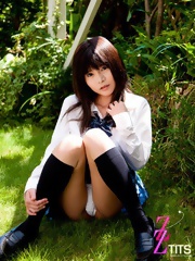 Yui Serizawa posing her large natural tits outdoors